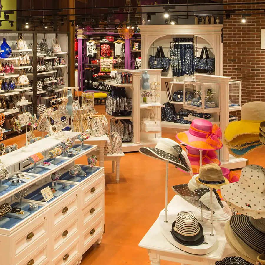 Bustling Marketplace at Disney Springs with various shops and lush vegetation