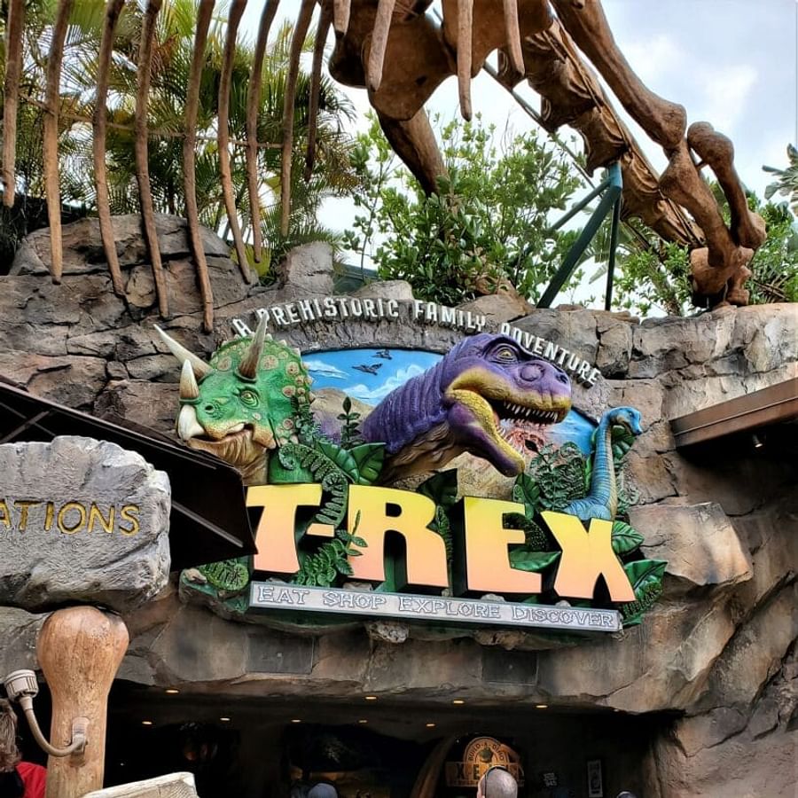 Exterior view of the vibrant T-Rex Cafe at Disney World