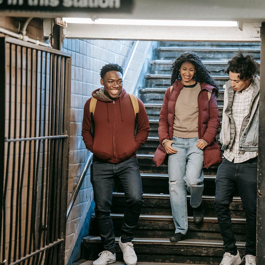 Excited family preparing to embark on a Disney World ride