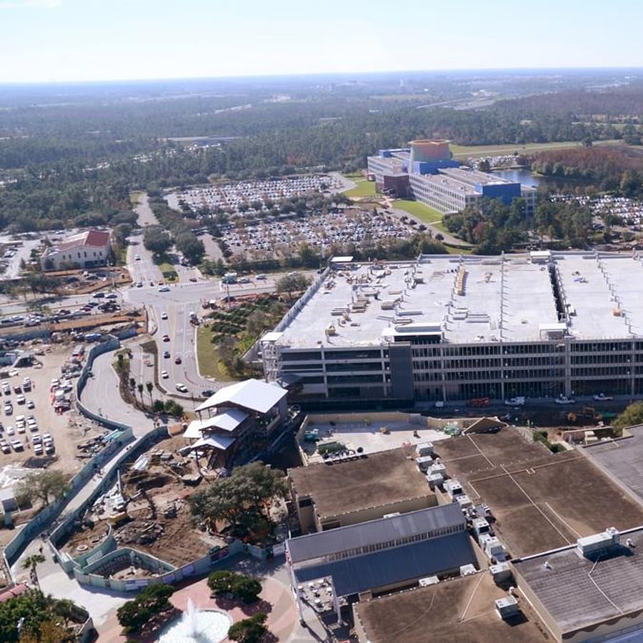 Aerial view of Disney Springs showcasing its expansive parking facilities